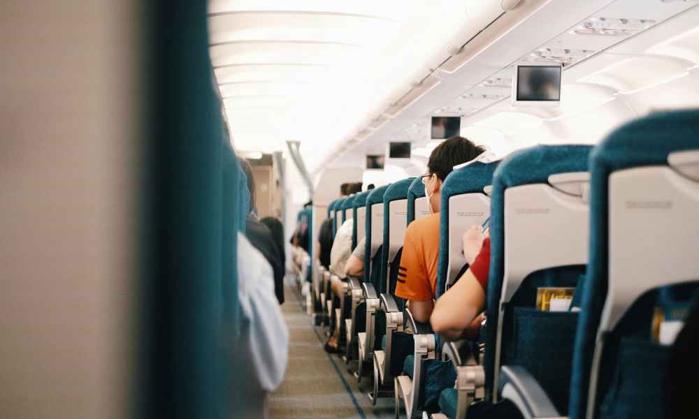 people sitting inside of airplane