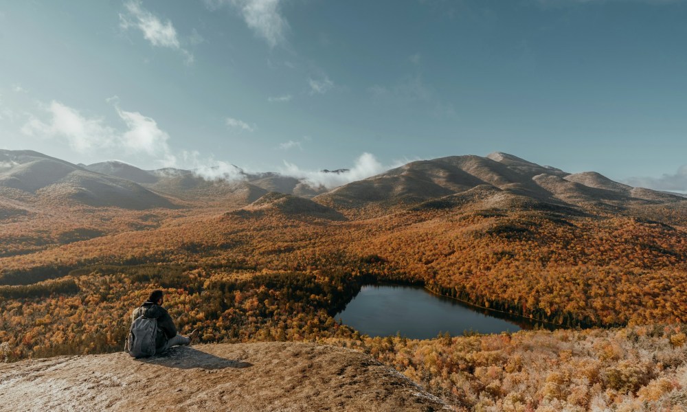 Man at an overlook during the fall