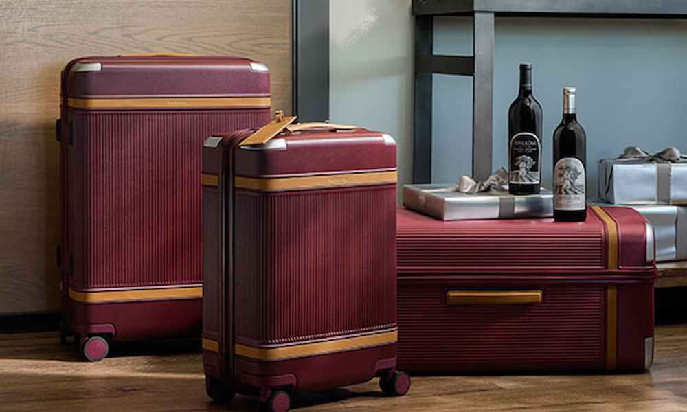 red suitcases with wine on top