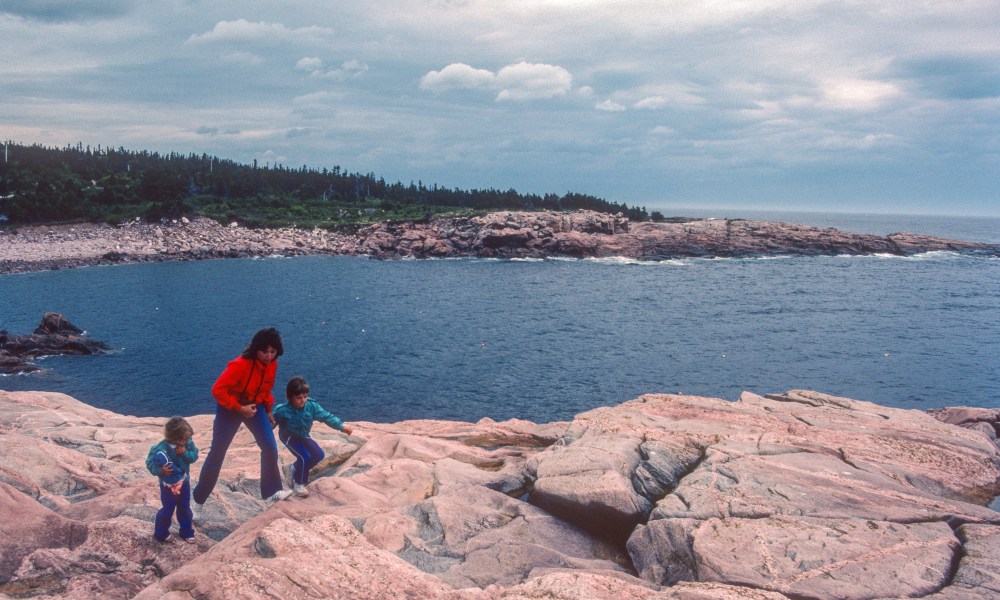 Cape Breton Highlands NP - Scrambling on the Granite - 1985. Scanned from Kodachrome 64 slide.