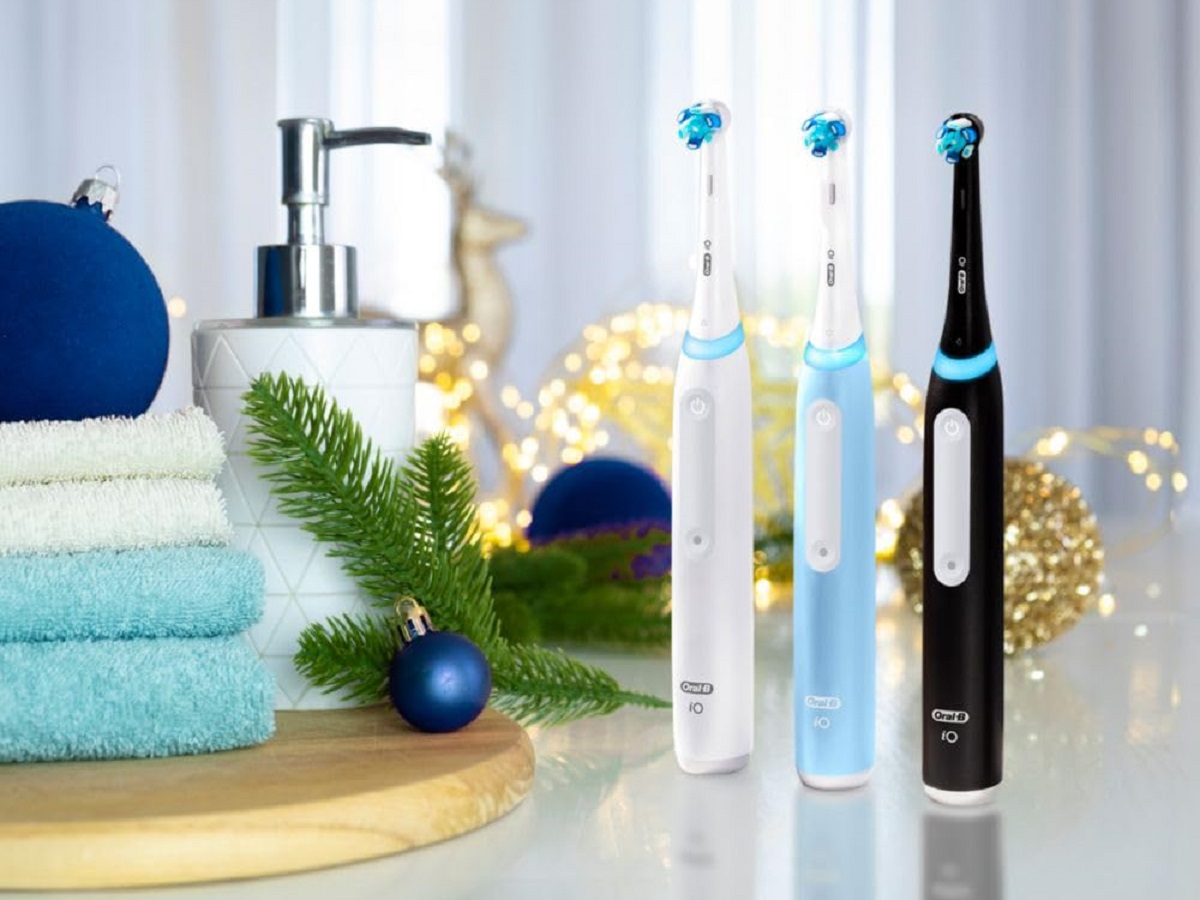 Three units of the Oral-B iO Series 3 Limited electric toothbrush in the bathroom.