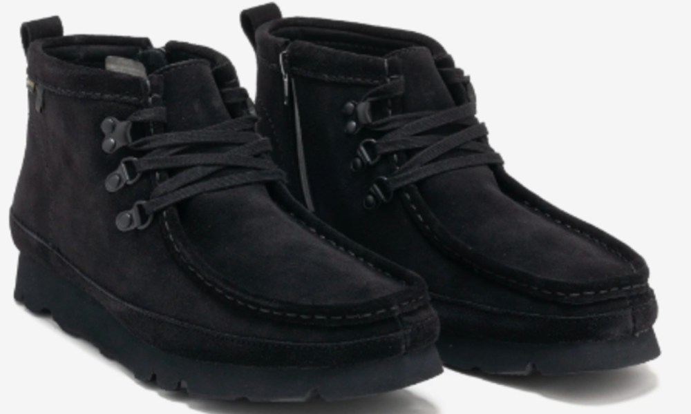 pair of clark's suede boots