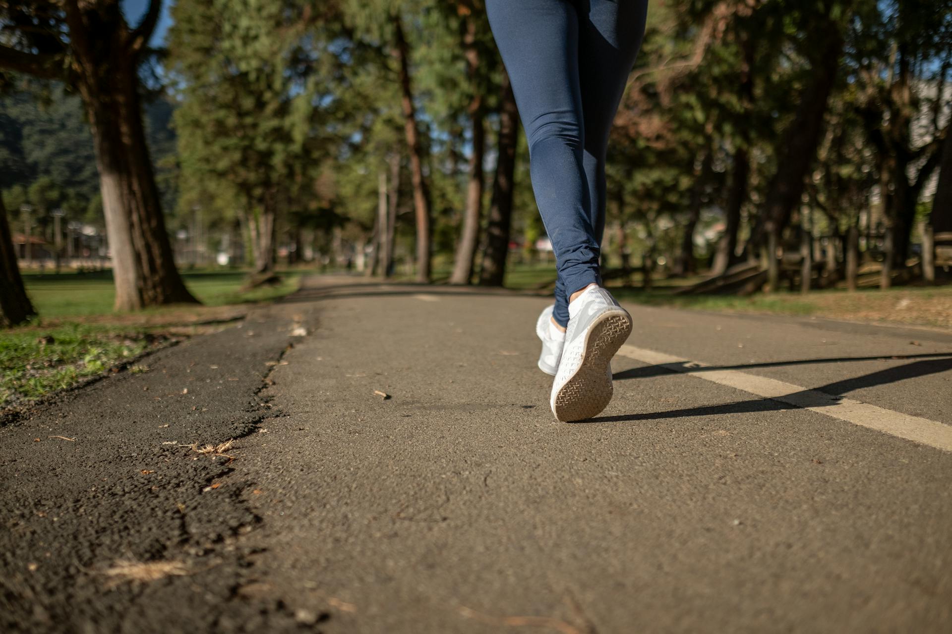 jogging outdoors woman shoes sneakers on road outside