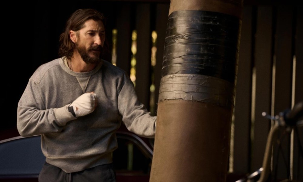 Buck Mason Welterweight Sweats hitting a bag