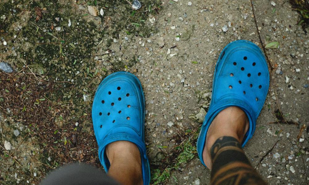 man wearing crocs